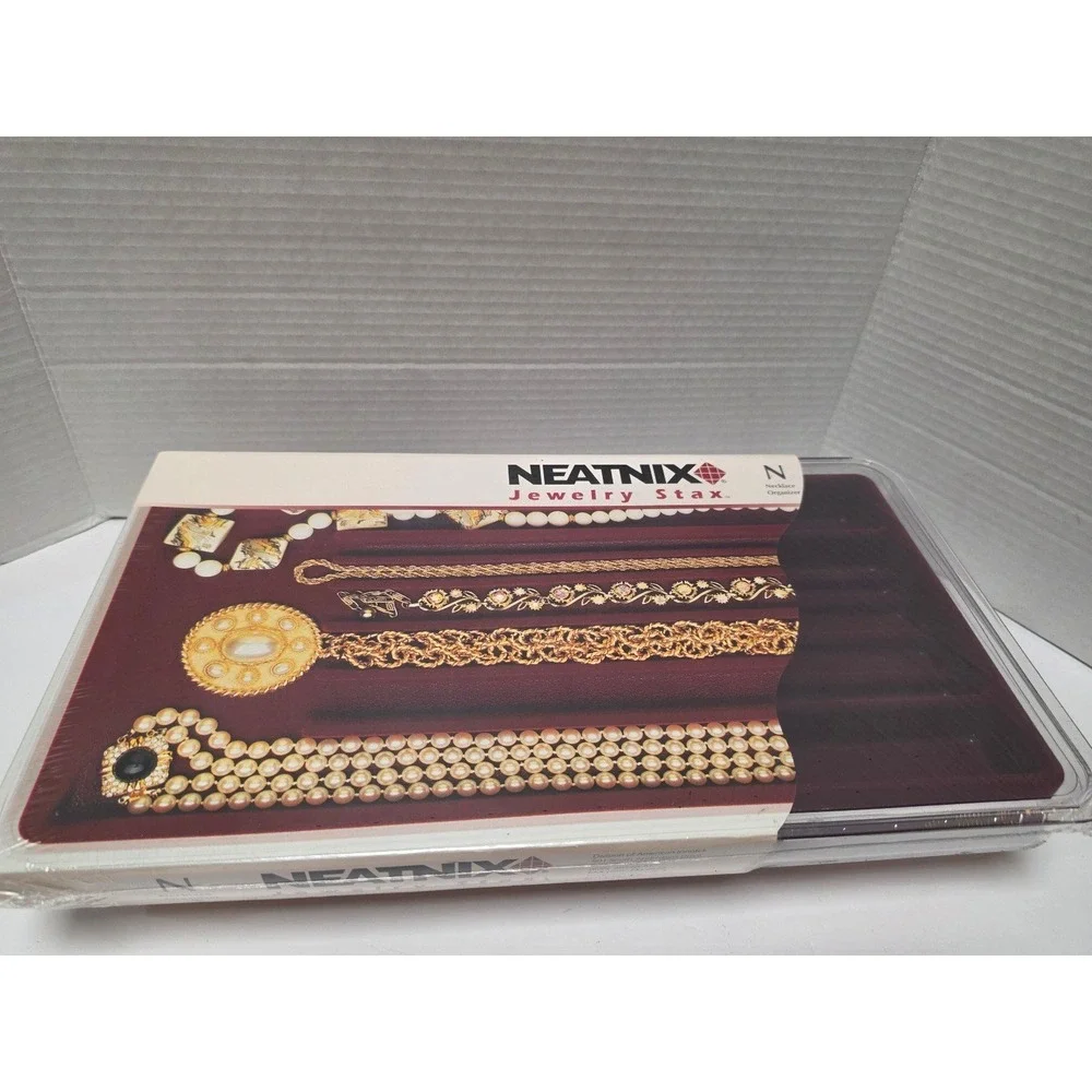 Neatnix Jewelry Stax necklace organizer tray featuring a burgundy red velvet